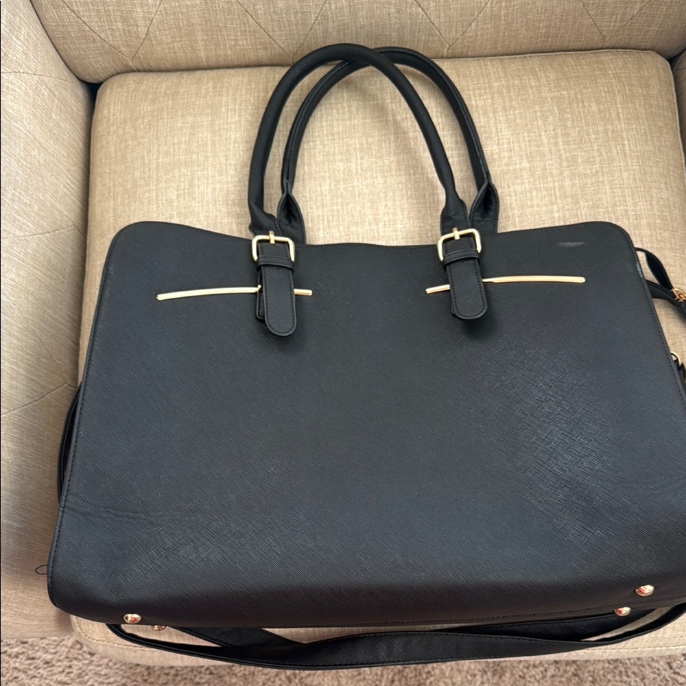 Elegant Black Handbag with Gold Accents
